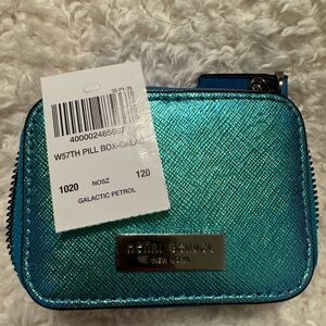Henri Bendel pill box galactic petrol